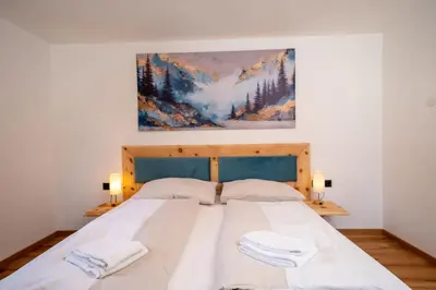 Ein Bett oder Betten in einem Zimmer der Unterkunft Apartments Kressl