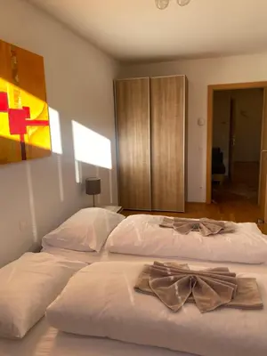 Ein Bett oder Betten in einem Zimmer der Unterkunft Penthouse TAMINO TOP 11