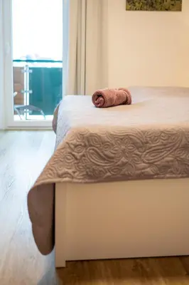 Ein Bett oder Betten in einem Zimmer der Unterkunft Apartment AUTHORIA