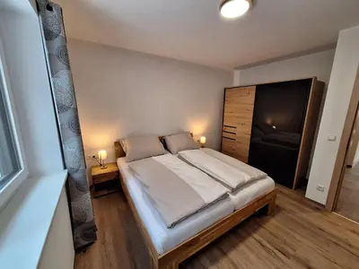 Ein Bett oder Betten in einem Zimmer der Unterkunft Ferienwohnung Peham