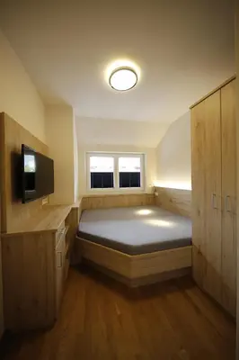Ein Bett oder Betten in einem Zimmer der Unterkunft Appartement Central by Schladmingurlaub