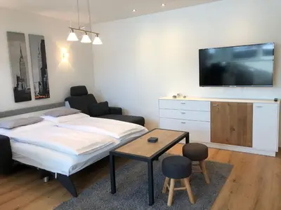 Ein Bett oder Betten in einem Zimmer der Unterkunft WM-Appartements