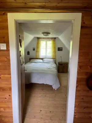 Ein Bett oder Betten in einem Zimmer der Unterkunft Ferienhütte Admont
