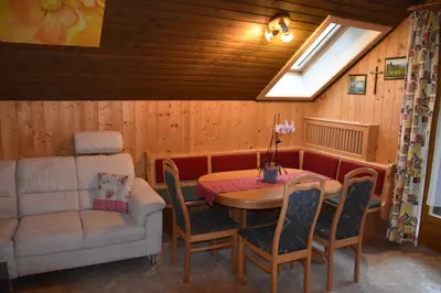 Ein Sitzbereich in der Unterkunft Apartment Krobath