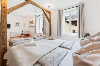 Ein Bett oder Betten in einem Zimmer der Unterkunft City Lofts Bad Aussee by Landluft