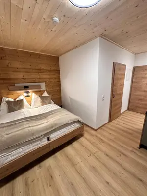 Ein Bett oder Betten in einem Zimmer der Unterkunft Alpin Studio Schladming 107