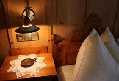 Ein Bett oder Betten in einem Zimmer der Unterkunft Oberprenner Troadkostn