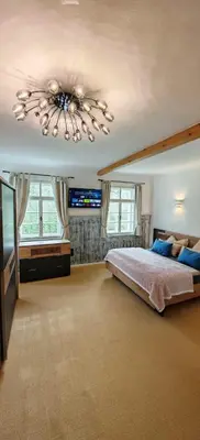 Ein Bett oder Betten in einem Zimmer der Unterkunft Forsthaus Faistenau