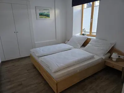 Ein Bett oder Betten in einem Zimmer der Unterkunft Murblick