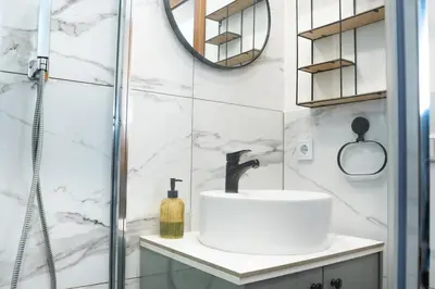 Ein Badezimmer in der Unterkunft Dili Appartement