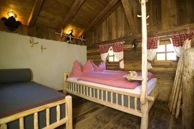 Ein Bett oder Betten in einem Zimmer der Unterkunft Gschwandtner Hüttn