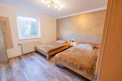 Ein Bett oder Betten in einem Zimmer der Unterkunft Apartmenthaus 113