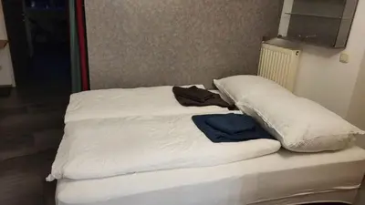 Ein Bett oder Betten in einem Zimmer der Unterkunft Apartments Ulrich vonLiechtenstein