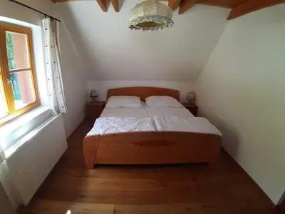 Ein Bett oder Betten in einem Zimmer der Unterkunft Holiday Home Lachtalhütte by Interhome
