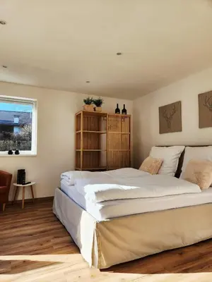 Ein Bett oder Betten in einem Zimmer der Unterkunft Bad Ischl Garten Apartment