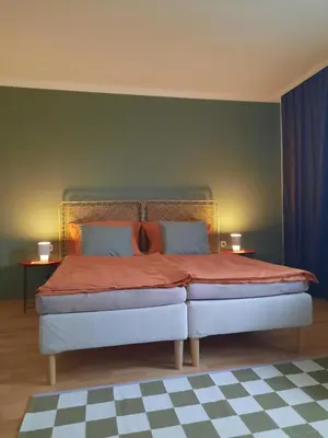 Ein Bett oder Betten in einem Zimmer der Unterkunft Im Stauberhaus