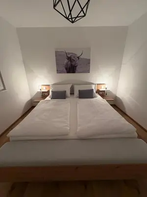 Ein Bett oder Betten in einem Zimmer der Unterkunft Appartement Fellsattler
