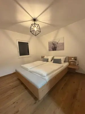 Ein Bett oder Betten in einem Zimmer der Unterkunft Appartement Fellsattler