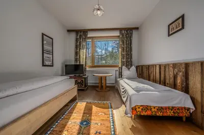 Ein Bett oder Betten in einem Zimmer der Unterkunft Haus Kogler