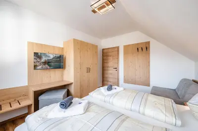 Ein Bett oder Betten in einem Zimmer der Unterkunft Stieglerhof Bergrefugium & Kaiblingblick - by myNests