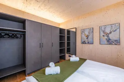 Ein Bett oder Betten in einem Zimmer der Unterkunft Panorama 198 - Schladming Tiny House - by myNests