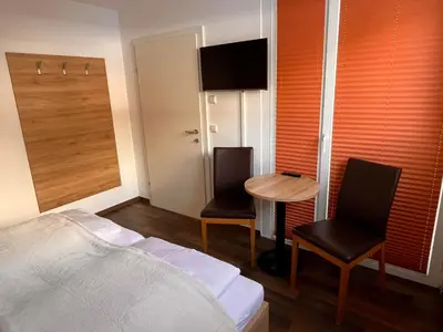 Ein Bett oder Betten in einem Zimmer der Unterkunft Ramsaublick