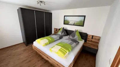 Ein Bett oder Betten in einem Zimmer der Unterkunft Ferienwohnung Mohr