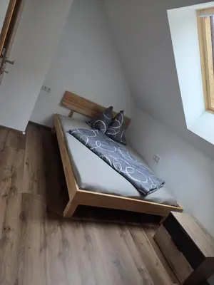 Ein Bett oder Betten in einem Zimmer der Unterkunft Apartment Altenberger