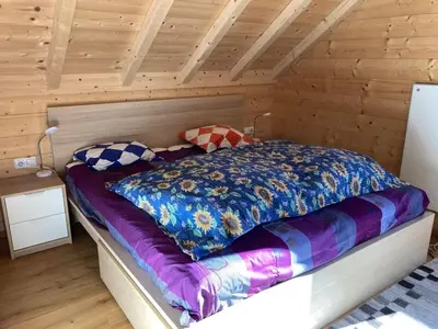 Ein Bett oder Betten in einem Zimmer der Unterkunft Hüttenzauber Lachtal