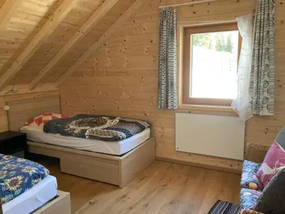 Ein Bett oder Betten in einem Zimmer der Unterkunft Hüttenzauber Lachtal
