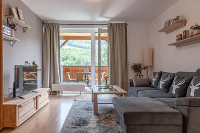 Ein Sitzbereich in der Unterkunft Ferienwohnung Grundlsee