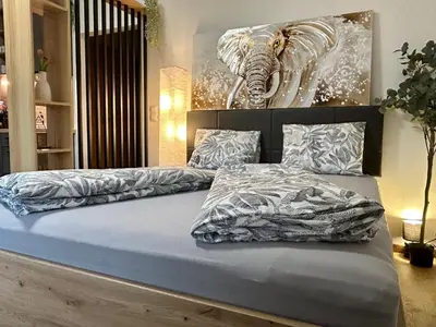 Ein Bett oder Betten in einem Zimmer der Unterkunft Dachsteinblick Haus im Ennstal - 5 min to Schladming - Sauna - Free Parking