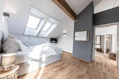 Ein Bett oder Betten in einem Zimmer der Unterkunft Villa Stella all famous ski areas around us, 15 minutes to salzburg, mountainview