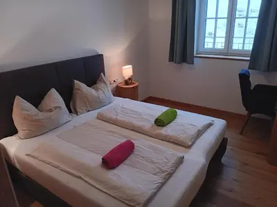 Ein Bett oder Betten in einem Zimmer der Unterkunft Top 103 Lärchenhof