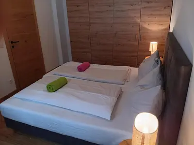 Ein Bett oder Betten in einem Zimmer der Unterkunft Top 103 Lärchenhof