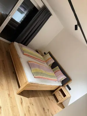 Ein Bett oder Betten in einem Zimmer der Unterkunft Tannenhof II