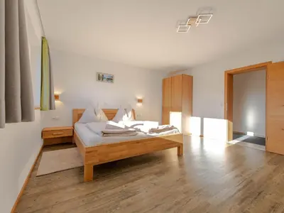 Ein Bett oder Betten in einem Zimmer der Unterkunft Mountain Apartment