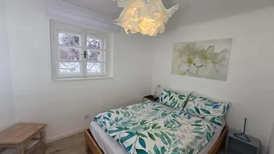 Ein Bett oder Betten in einem Zimmer der Unterkunft The Garden Residence