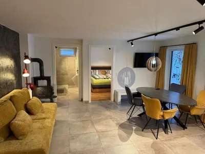 Ein Sitzbereich in der Unterkunft Apartment Tannenhof V