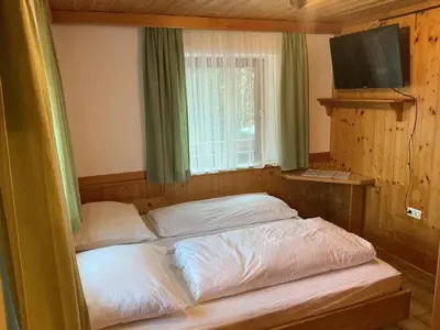 Ein Bett oder Betten in einem Zimmer der Unterkunft Haus Martin Appartement Eichhörnchen
