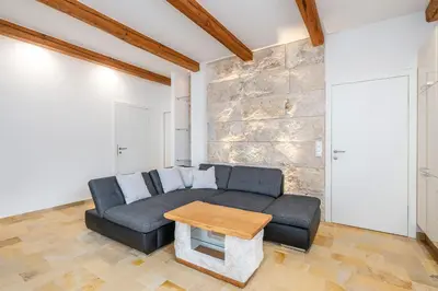 Ein Sitzbereich in der Unterkunft Apartment Höchstein - Stone & Light Residence - by myNests