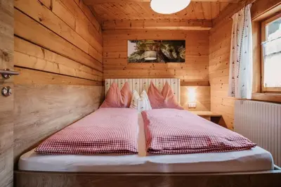 Ein Bett oder Betten in einem Zimmer der Unterkunft Chalet Naturblick am ZwisleggGut