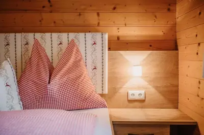 Ein Bett oder Betten in einem Zimmer der Unterkunft Chalet Naturblick am ZwisleggGut