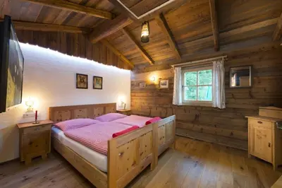 Ein Bett oder Betten in einem Zimmer der Unterkunft Chalet Steinbock