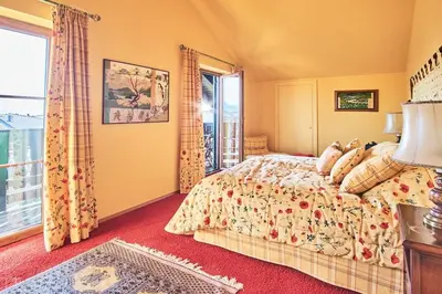 Ein Bett oder Betten in einem Zimmer der Unterkunft Comfortable and spacious apartment with garden in Mondsee Tiefgarben
