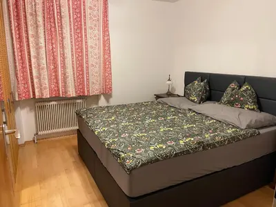Ein Bett oder Betten in einem Zimmer der Unterkunft AAA Ferienwohnung Bad Ischl