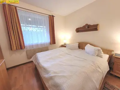 Ein Bett oder Betten in einem Zimmer der Unterkunft Bungalow Irmgard