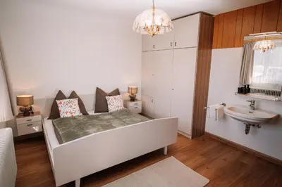 Ein Bett oder Betten in einem Zimmer der Unterkunft Alpenblick Gösweiner