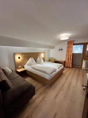 Ein Bett oder Betten in einem Zimmer der Unterkunft Skylofts-Sonnhang