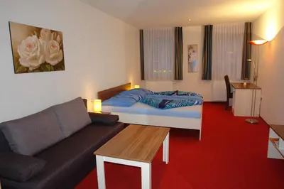 Ein Bett oder Betten in einem Zimmer der Unterkunft Hotel Garni Daniela Urich